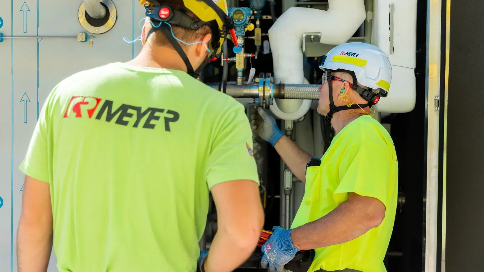 industrial technicians inspecting equipment