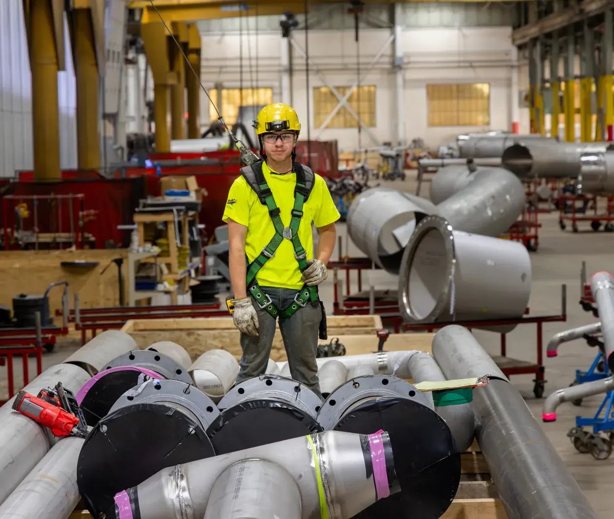 industrial-worker-safety-gear-pipes-factory-1260x1066