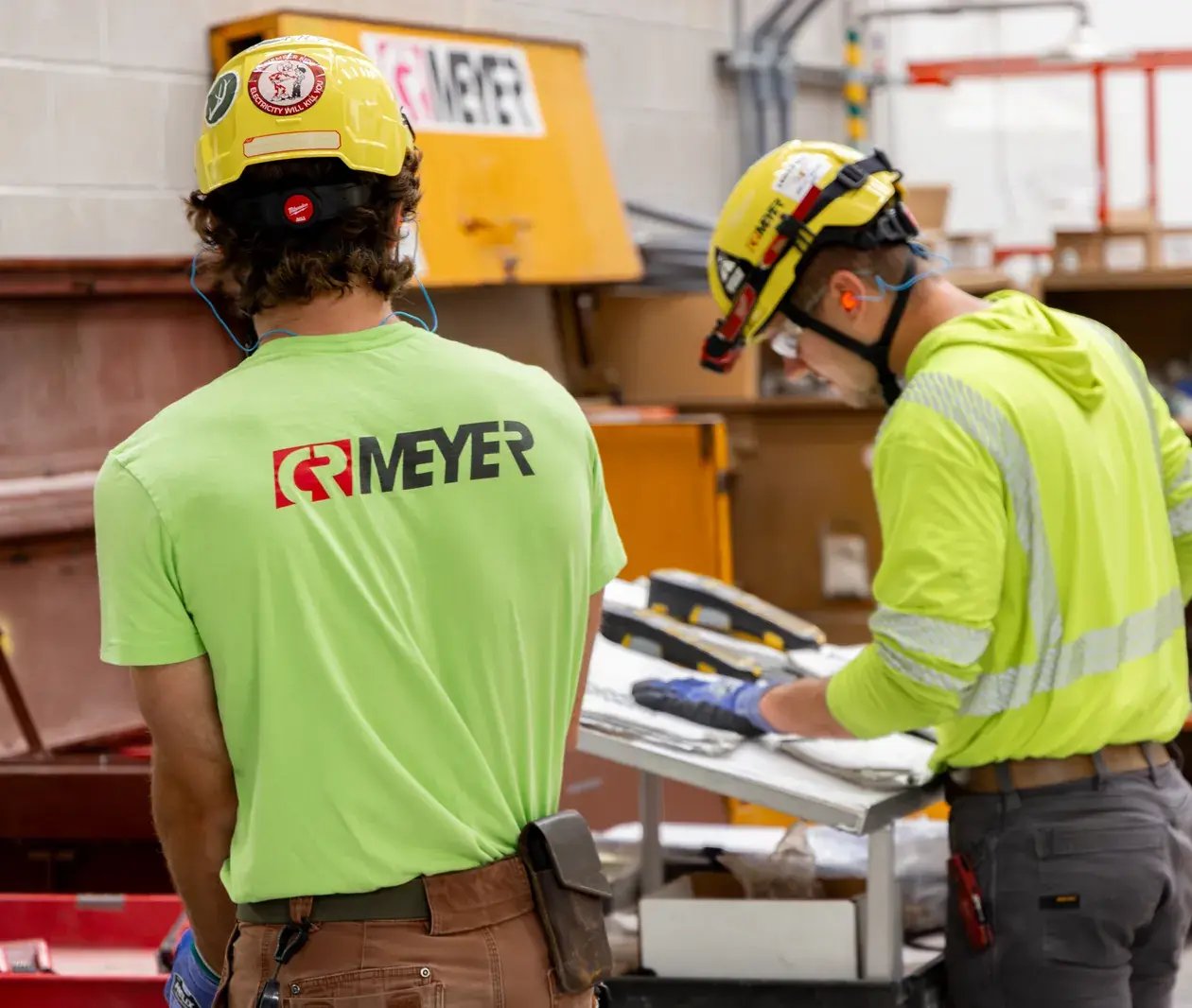 two-workers-meyer-company-warehouse-ppe-1260x1066